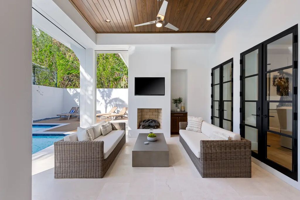 9201 Mercato Way, Naples, Florida is a magnificent gem in the heart of the Residences at Mercato just minutes from the famous Vanderbilt Beach with a custom outdoor oasis, an open floor plan, and designer touches throughout.