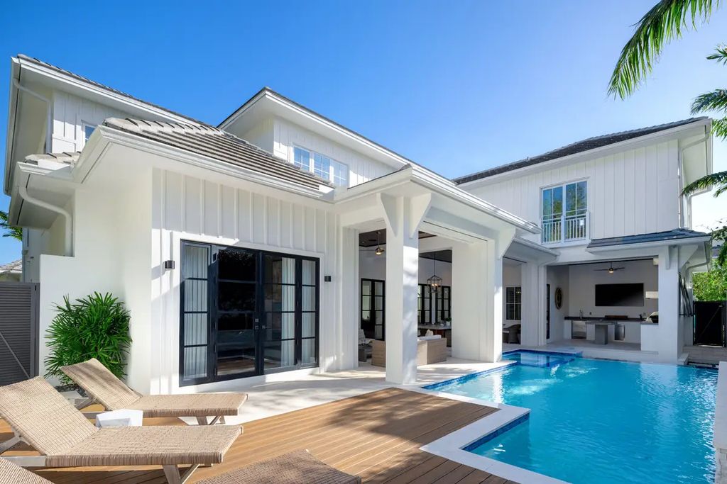 9201 Mercato Way, Naples, Florida is a magnificent gem in the heart of the Residences at Mercato just minutes from the famous Vanderbilt Beach with a custom outdoor oasis, an open floor plan, and designer touches throughout.