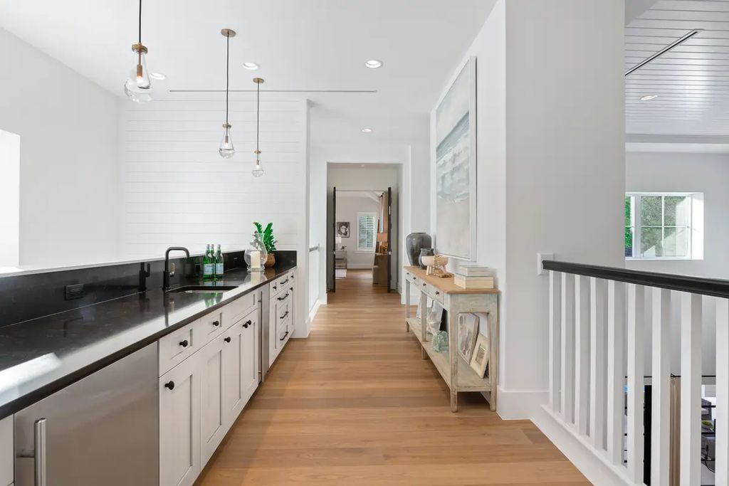 9201 Mercato Way, Naples, Florida is a magnificent gem in the heart of the Residences at Mercato just minutes from the famous Vanderbilt Beach with a custom outdoor oasis, an open floor plan, and designer touches throughout.