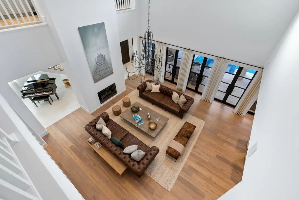 9201 Mercato Way, Naples, Florida is a magnificent gem in the heart of the Residences at Mercato just minutes from the famous Vanderbilt Beach with a custom outdoor oasis, an open floor plan, and designer touches throughout.