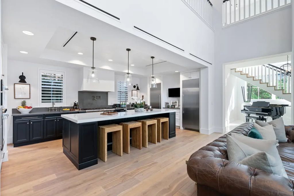9201 Mercato Way, Naples, Florida is a magnificent gem in the heart of the Residences at Mercato just minutes from the famous Vanderbilt Beach with a custom outdoor oasis, an open floor plan, and designer touches throughout.