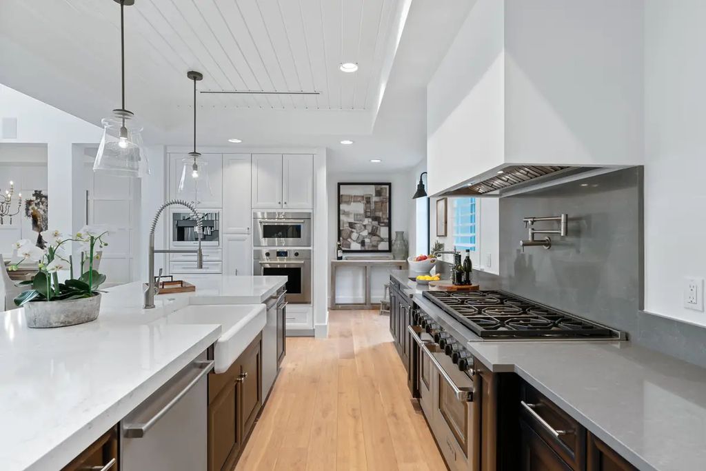 9201 Mercato Way, Naples, Florida is a magnificent gem in the heart of the Residences at Mercato just minutes from the famous Vanderbilt Beach with a custom outdoor oasis, an open floor plan, and designer touches throughout.