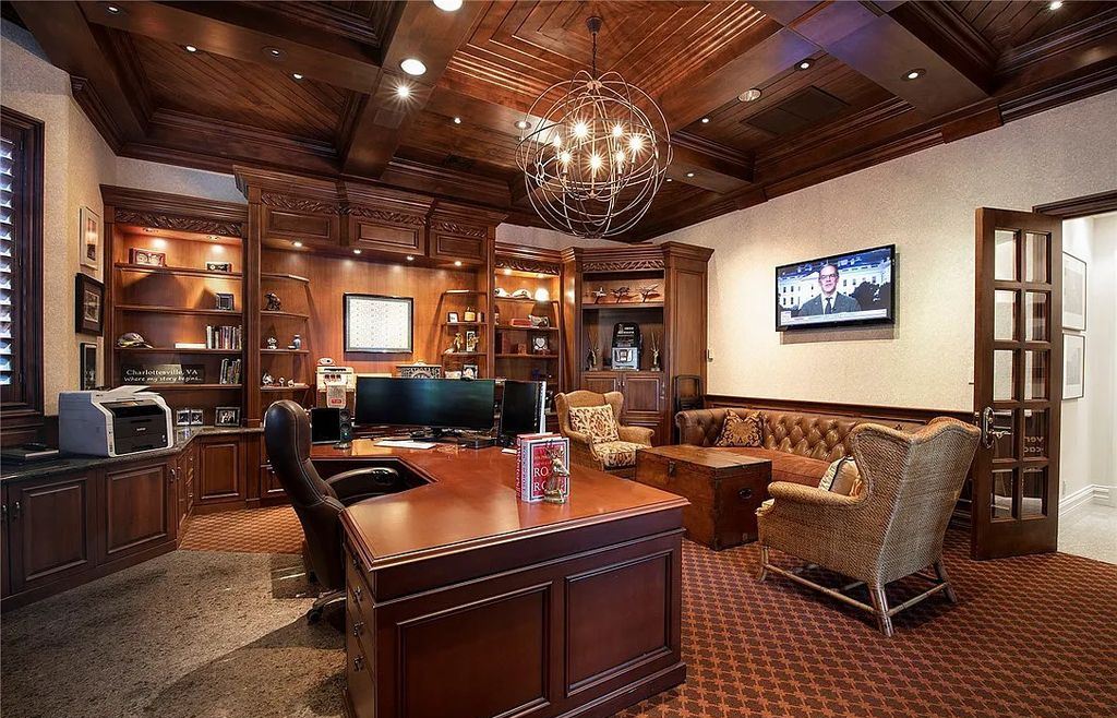8920 Players Club Drive, Las Vegas, Nevada is a sprawling estate designed for entertaining on a grand scale with soaring ceiling heights, expansive entry, and ornate marble and carpet floor patterns.