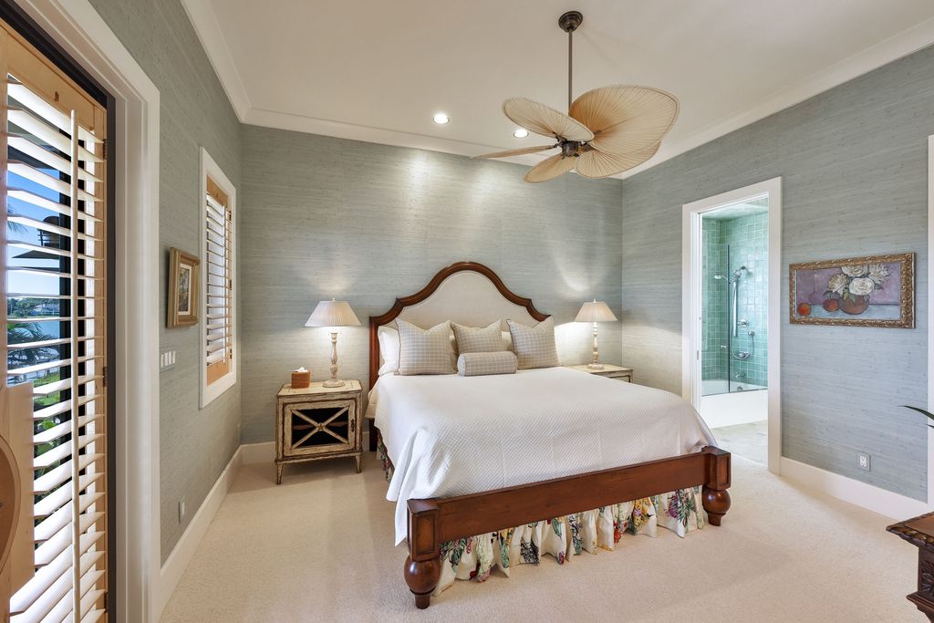 1450 Gulfstar Drive South, Naples, Florida is an impressive home combining the ultimate in interior finishes and exterior amenities, over 4,800 square feet of outdoor living area, unmatched design and exquisite finishes throughout.