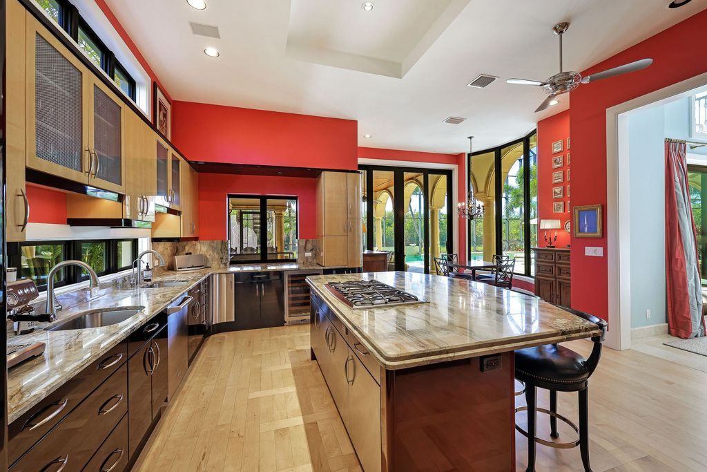 1450 Gulfstar Drive South, Naples, Florida is an impressive home combining the ultimate in interior finishes and exterior amenities, over 4,800 square feet of outdoor living area, unmatched design and exquisite finishes throughout.