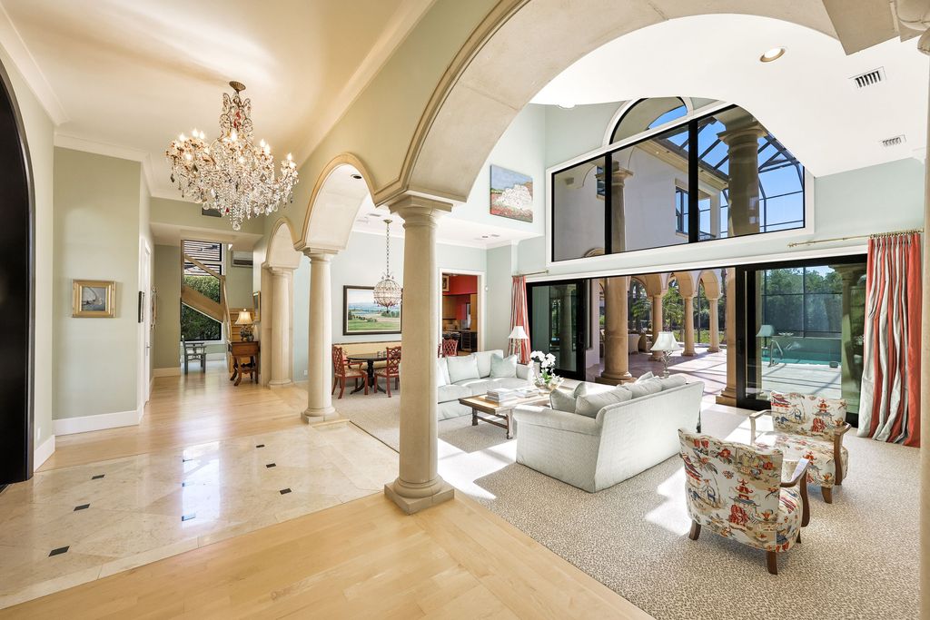 1450 Gulfstar Drive South, Naples, Florida is an impressive home combining the ultimate in interior finishes and exterior amenities, over 4,800 square feet of outdoor living area, unmatched design and exquisite finishes throughout.