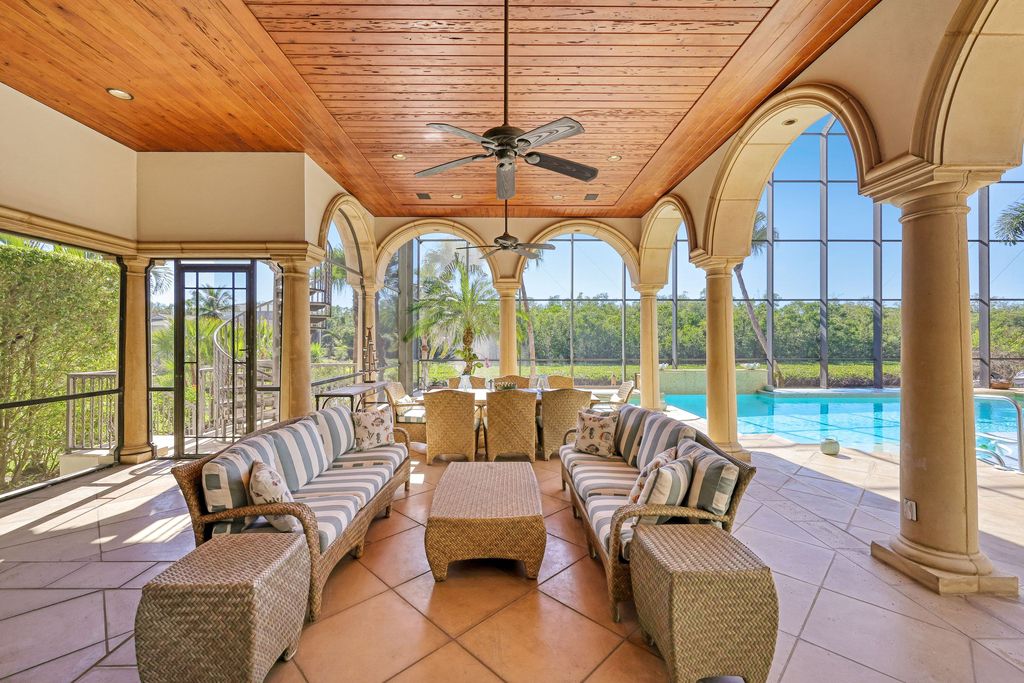 1450 Gulfstar Drive South, Naples, Florida is an impressive home combining the ultimate in interior finishes and exterior amenities, over 4,800 square feet of outdoor living area, unmatched design and exquisite finishes throughout.
