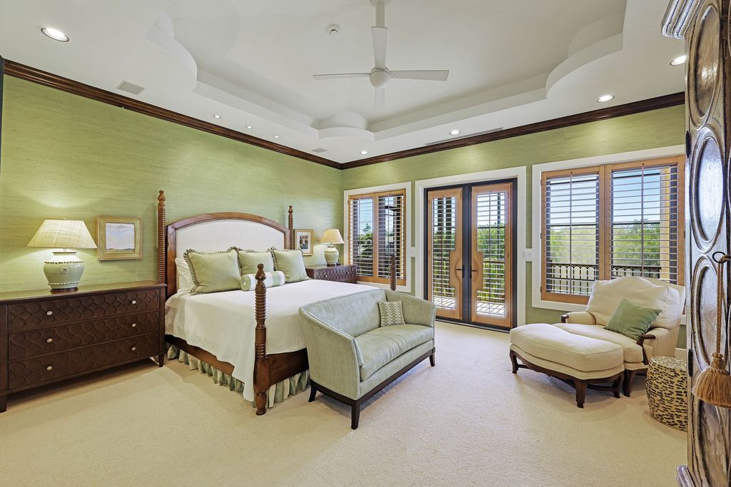 1450 Gulfstar Drive South, Naples, Florida is an impressive home combining the ultimate in interior finishes and exterior amenities, over 4,800 square feet of outdoor living area, unmatched design and exquisite finishes throughout.