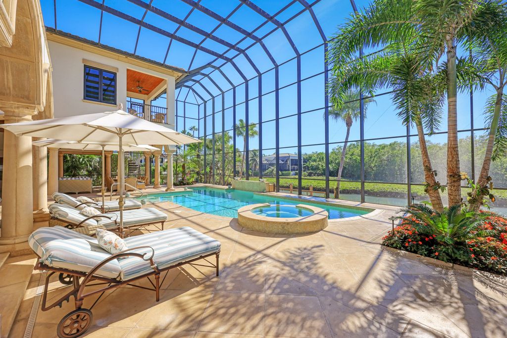 1450 Gulfstar Drive South, Naples, Florida is an impressive home combining the ultimate in interior finishes and exterior amenities, over 4,800 square feet of outdoor living area, unmatched design and exquisite finishes throughout.
