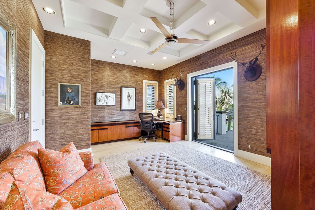 1450 Gulfstar Drive South, Naples, Florida is an impressive home combining the ultimate in interior finishes and exterior amenities, over 4,800 square feet of outdoor living area, unmatched design and exquisite finishes throughout.