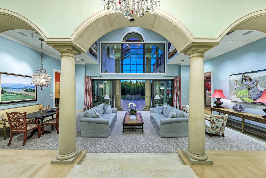 1450 Gulfstar Drive South, Naples, Florida is an impressive home combining the ultimate in interior finishes and exterior amenities, over 4,800 square feet of outdoor living area, unmatched design and exquisite finishes throughout.