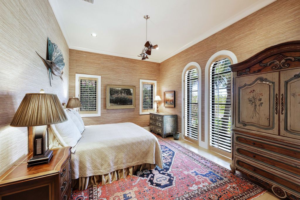 1450 Gulfstar Drive South, Naples, Florida is an impressive home combining the ultimate in interior finishes and exterior amenities, over 4,800 square feet of outdoor living area, unmatched design and exquisite finishes throughout.