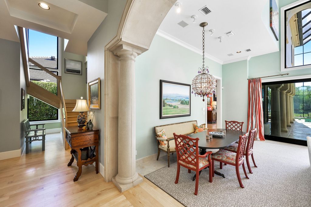 1450 Gulfstar Drive South, Naples, Florida is an impressive home combining the ultimate in interior finishes and exterior amenities, over 4,800 square feet of outdoor living area, unmatched design and exquisite finishes throughout.