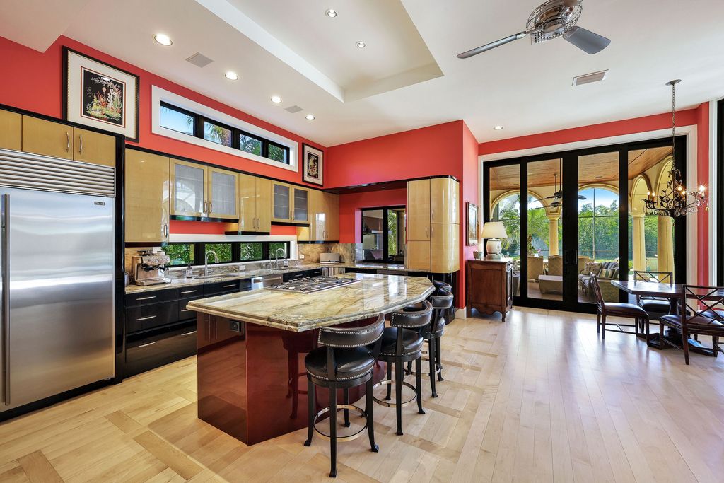 1450 Gulfstar Drive South, Naples, Florida is an impressive home combining the ultimate in interior finishes and exterior amenities, over 4,800 square feet of outdoor living area, unmatched design and exquisite finishes throughout.