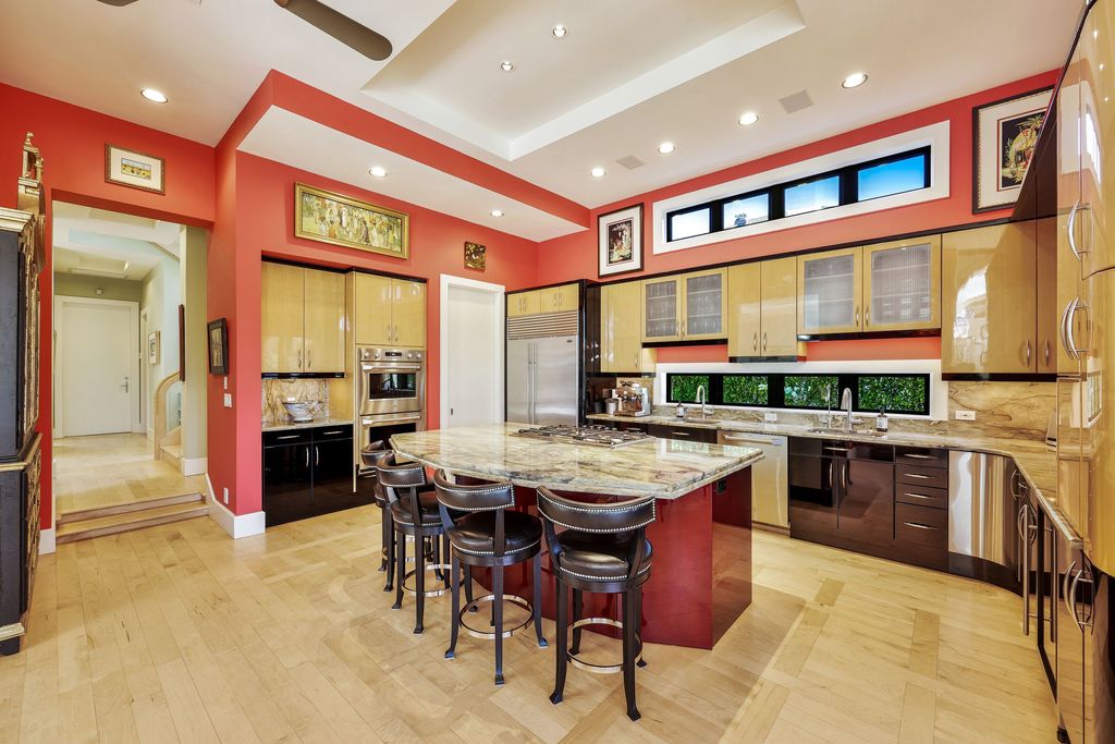1450 Gulfstar Drive South, Naples, Florida is an impressive home combining the ultimate in interior finishes and exterior amenities, over 4,800 square feet of outdoor living area, unmatched design and exquisite finishes throughout.