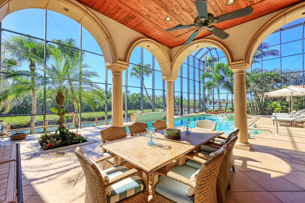 1450 Gulfstar Drive South, Naples, Florida is an impressive home combining the ultimate in interior finishes and exterior amenities, over 4,800 square feet of outdoor living area, unmatched design and exquisite finishes throughout.
