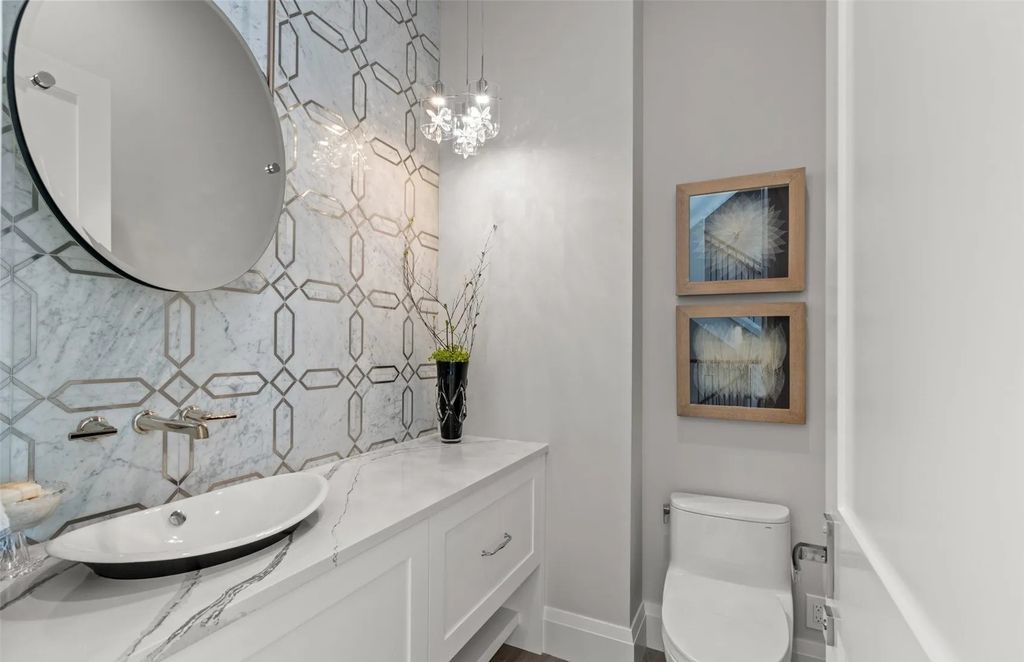 The Home in Bellevue was custom built in 2021 with high-end finishes and modern amenities, now available for sale. This home located at 9563 NE 1st Street, Bellevue, Washington