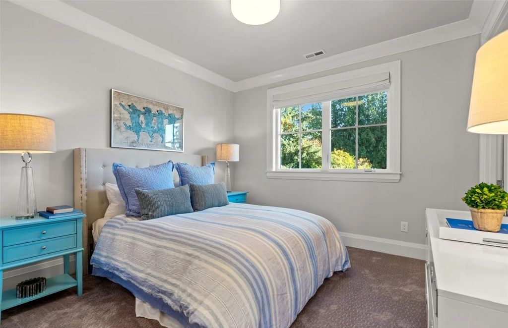 The Home in Bellevue was custom built in 2021 with high-end finishes and modern amenities, now available for sale. This home located at 9563 NE 1st Street, Bellevue, Washington