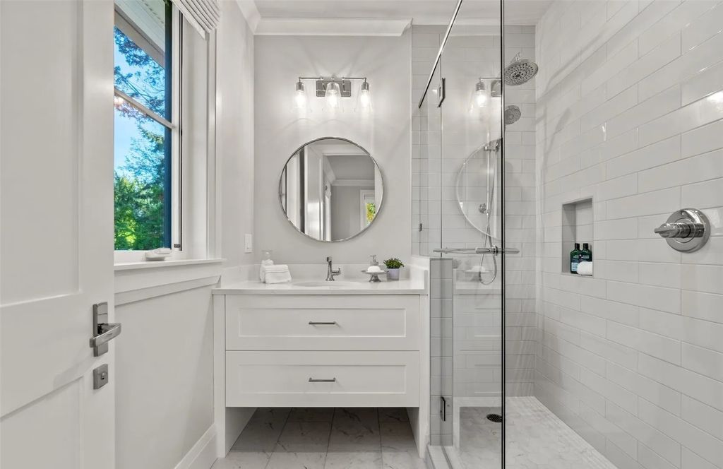The Home in Bellevue was custom built in 2021 with high-end finishes and modern amenities, now available for sale. This home located at 9563 NE 1st Street, Bellevue, Washington