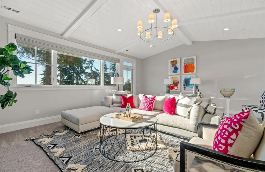 The Home in Bellevue was custom built in 2021 with high-end finishes and modern amenities, now available for sale. This home located at 9563 NE 1st Street, Bellevue, Washington
