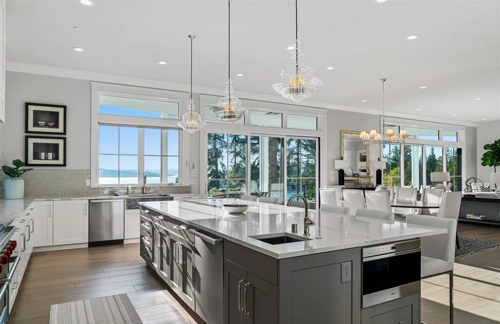 The Home in Bellevue was custom built in 2021 with high-end finishes and modern amenities, now available for sale. This home located at 9563 NE 1st Street, Bellevue, Washington