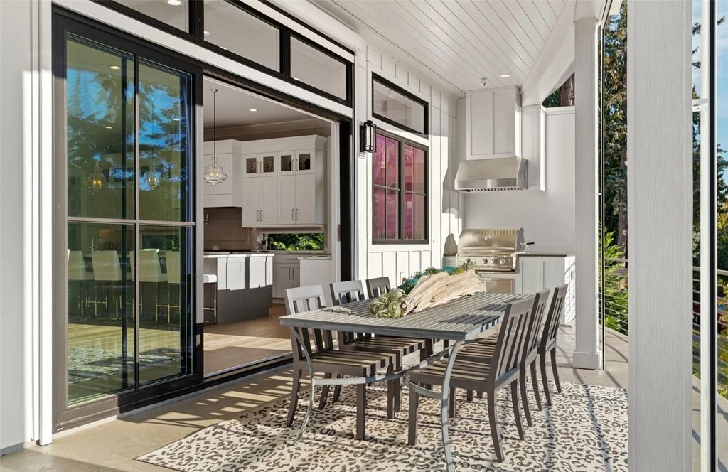 The Home in Bellevue was custom built in 2021 with high-end finishes and modern amenities, now available for sale. This home located at 9563 NE 1st Street, Bellevue, Washington