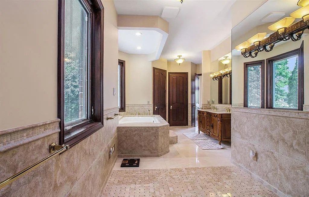 The Home in Fenton is a luxurious home with all the amenities for your elegant lifestyle, now available for sale. This home located at 75 Chateaux Du Lac, Fenton, Michigan