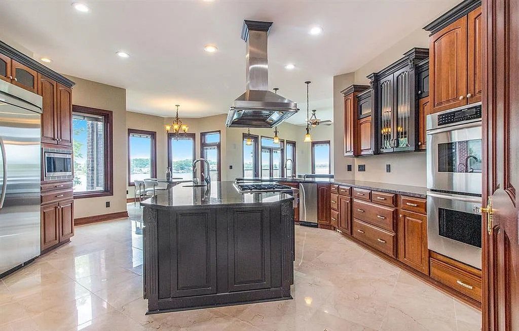 The Home in Fenton is a luxurious home with all the amenities for your elegant lifestyle, now available for sale. This home located at 75 Chateaux Du Lac, Fenton, Michigan