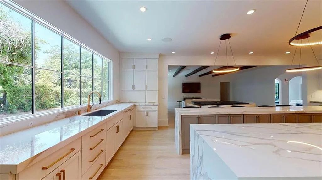 The Estate in Atlanta is a luxurious home revealing seamless indoor and outdoor living spaces now available for sale. This home located at 3206 Arden Rd NW, Atlanta, Georgia; offering 07 bedrooms and 08 bathrooms with 17,887 square feet of living spaces.