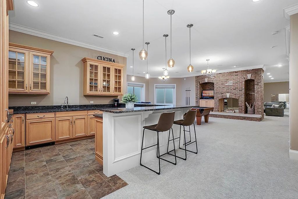 The Estate in Naperville is a luxurious home of architectural perfection and exceptional features now available for sale. This home located at 8S061 Indiana Ave, Naperville, Illinois; offering 05 bedrooms and 10 bathrooms with 9,940 square feet of living spaces.