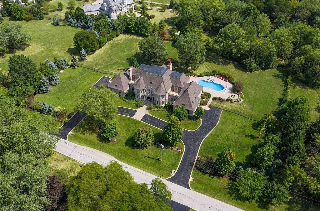 The Estate in Naperville is a luxurious home of architectural perfection and exceptional features now available for sale. This home located at 8S061 Indiana Ave, Naperville, Illinois; offering 05 bedrooms and 10 bathrooms with 9,940 square feet of living spaces.