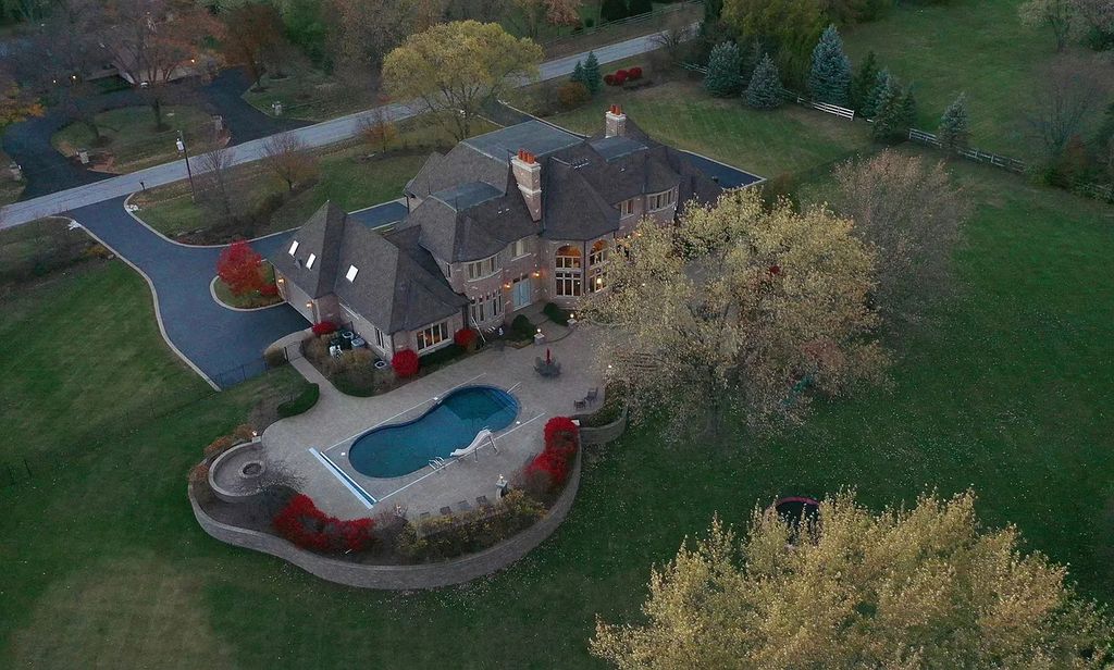 The Estate in Naperville is a luxurious home of architectural perfection and exceptional features now available for sale. This home located at 8S061 Indiana Ave, Naperville, Illinois; offering 05 bedrooms and 10 bathrooms with 9,940 square feet of living spaces.