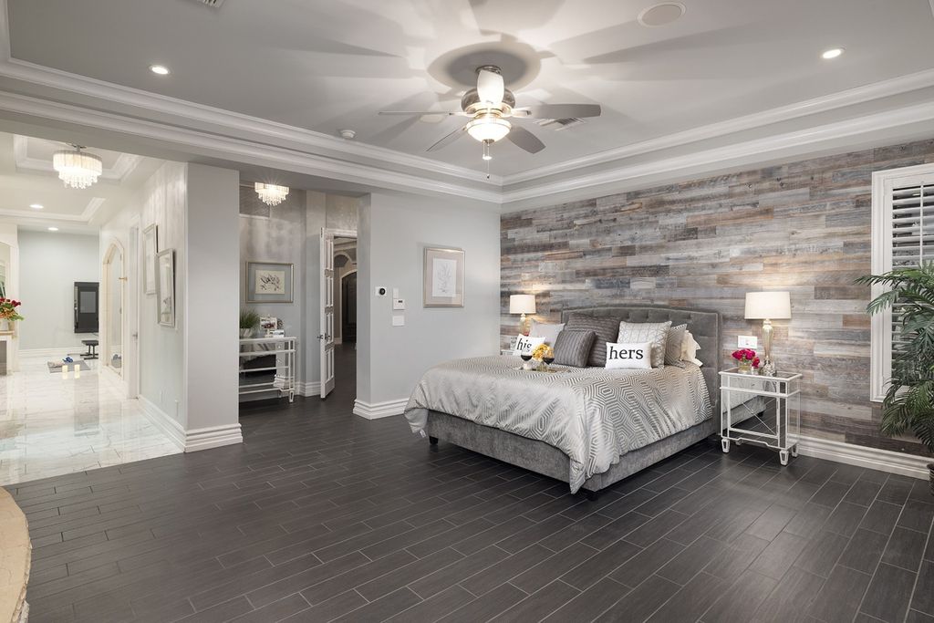 1513 Villa Rica Drive, Henderson, Nevada is a chic home in the Estates in Seven Hills with resort amenities including indoor-outdoor bar, movie theater, smart home, entertainers kitchen, bar seating, chic mirrored backsplash and more.