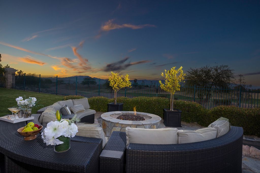 1513 Villa Rica Drive, Henderson, Nevada is a chic home in the Estates in Seven Hills with resort amenities including indoor-outdoor bar, movie theater, smart home, entertainers kitchen, bar seating, chic mirrored backsplash and more.