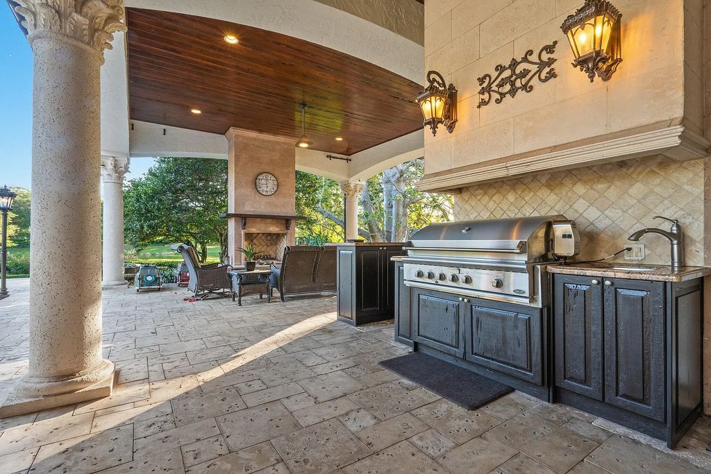 6030 Le Lac Road, Boca Raton, Florida, designed by award-winning architect Randall Stofft, is an exquisite lakefront estate located on 2.13 acres of meticulously manicured grounds within Boca Raton's most prestigious neighborhoods.