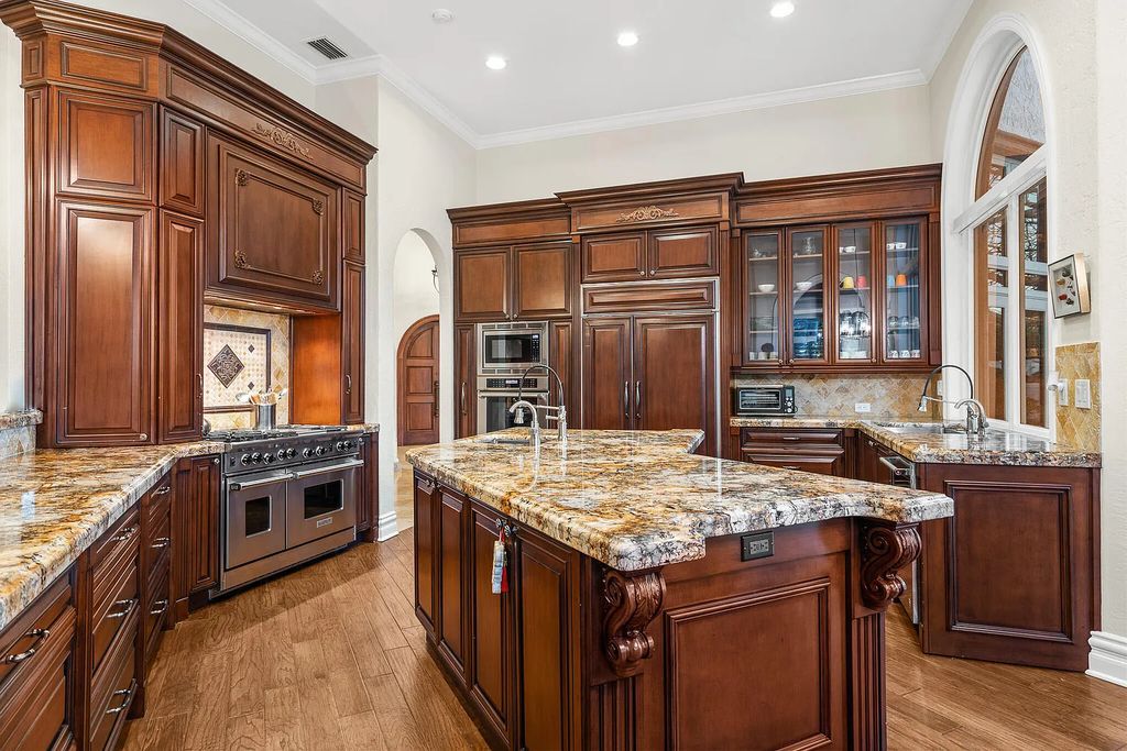 6030 Le Lac Road, Boca Raton, Florida, designed by award-winning architect Randall Stofft, is an exquisite lakefront estate located on 2.13 acres of meticulously manicured grounds within Boca Raton's most prestigious neighborhoods.