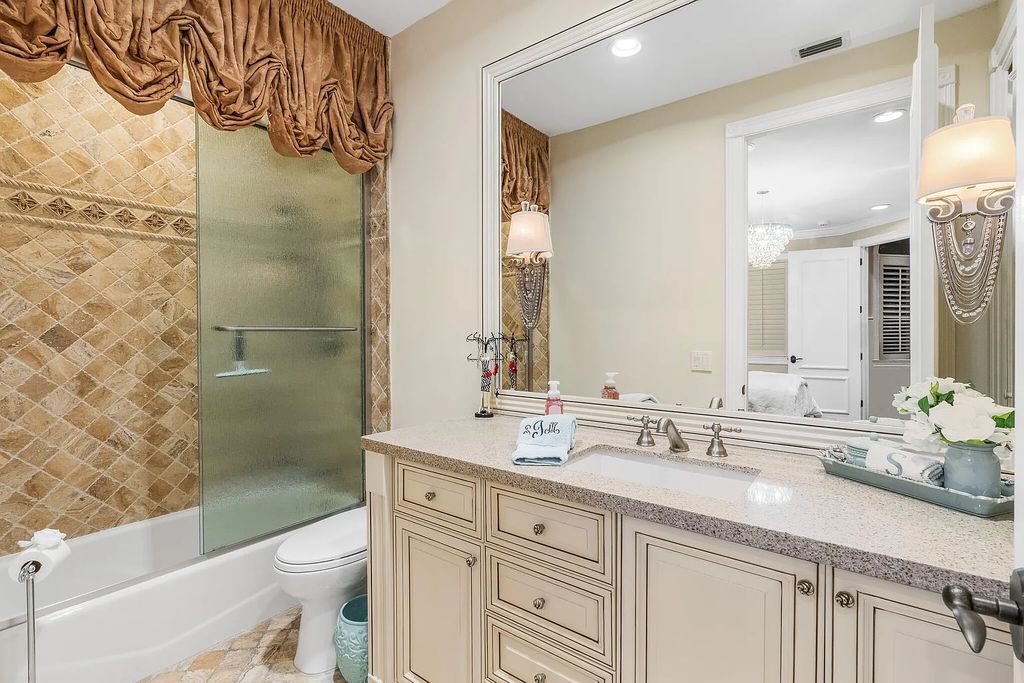 6030 Le Lac Road, Boca Raton, Florida, designed by award-winning architect Randall Stofft, is an exquisite lakefront estate located on 2.13 acres of meticulously manicured grounds within Boca Raton's most prestigious neighborhoods.