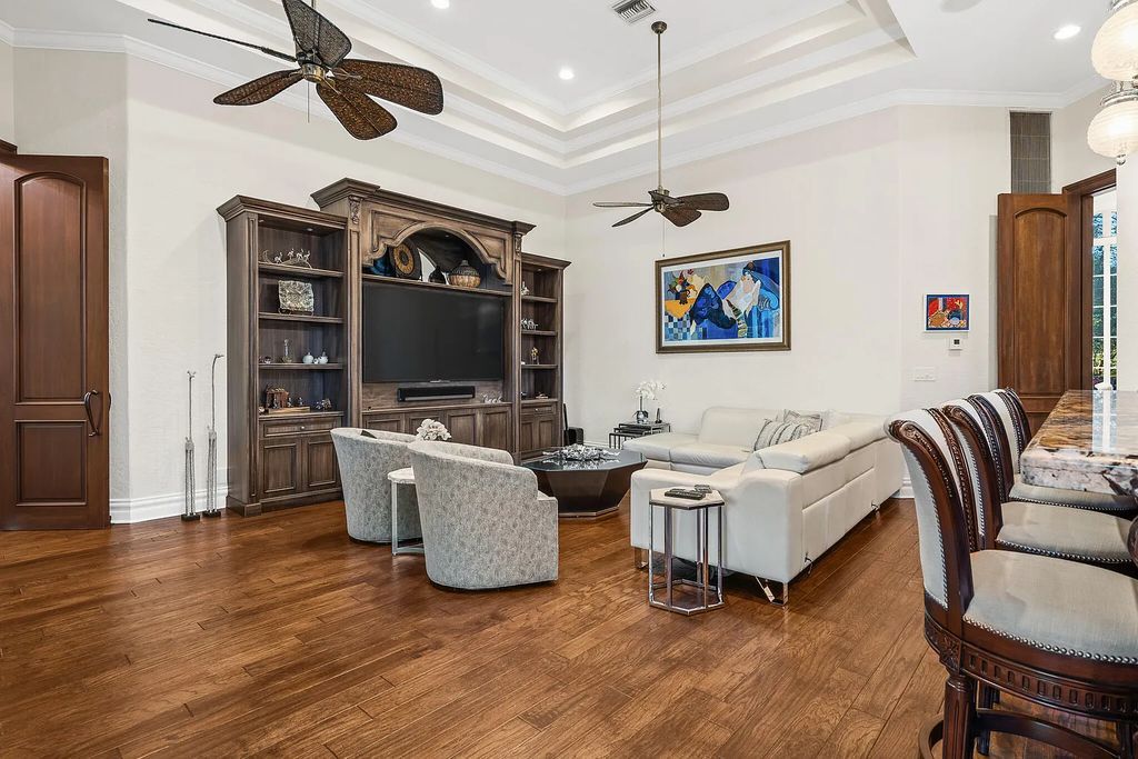 6030 Le Lac Road, Boca Raton, Florida, designed by award-winning architect Randall Stofft, is an exquisite lakefront estate located on 2.13 acres of meticulously manicured grounds within Boca Raton's most prestigious neighborhoods.