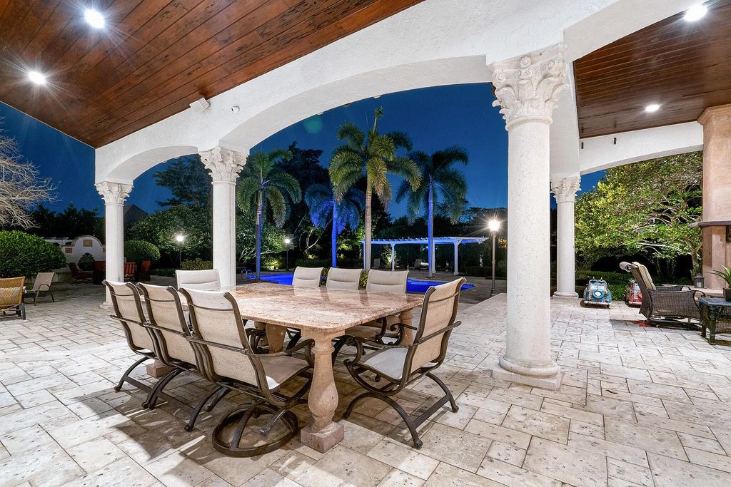 6030 Le Lac Road, Boca Raton, Florida, designed by award-winning architect Randall Stofft, is an exquisite lakefront estate located on 2.13 acres of meticulously manicured grounds within Boca Raton's most prestigious neighborhoods.