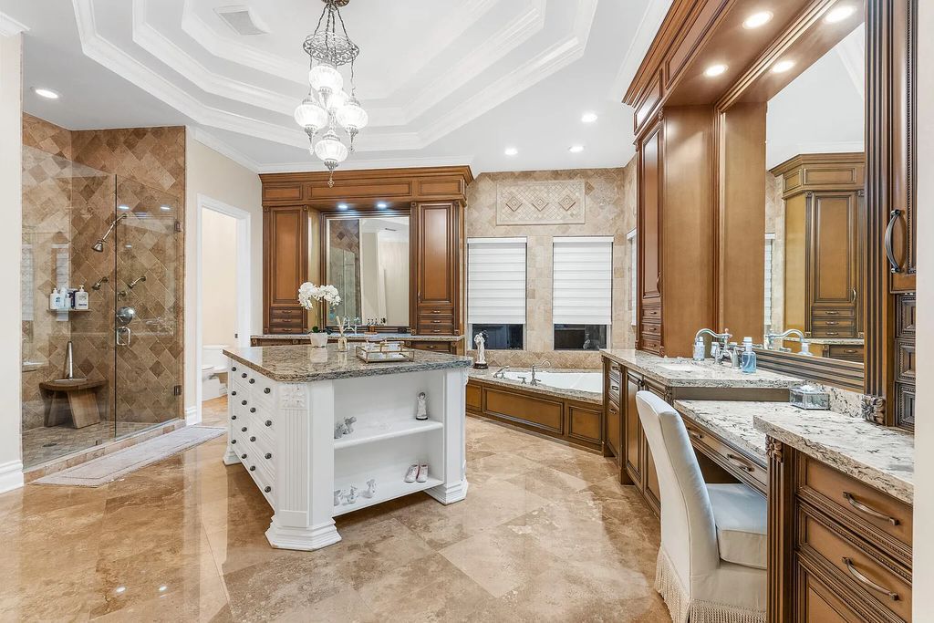 6030 Le Lac Road, Boca Raton, Florida, designed by award-winning architect Randall Stofft, is an exquisite lakefront estate located on 2.13 acres of meticulously manicured grounds within Boca Raton's most prestigious neighborhoods.