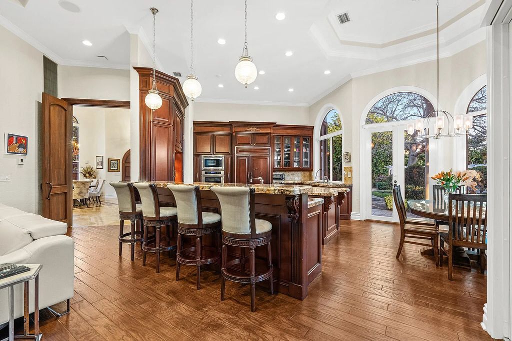 6030 Le Lac Road, Boca Raton, Florida, designed by award-winning architect Randall Stofft, is an exquisite lakefront estate located on 2.13 acres of meticulously manicured grounds within Boca Raton's most prestigious neighborhoods.
