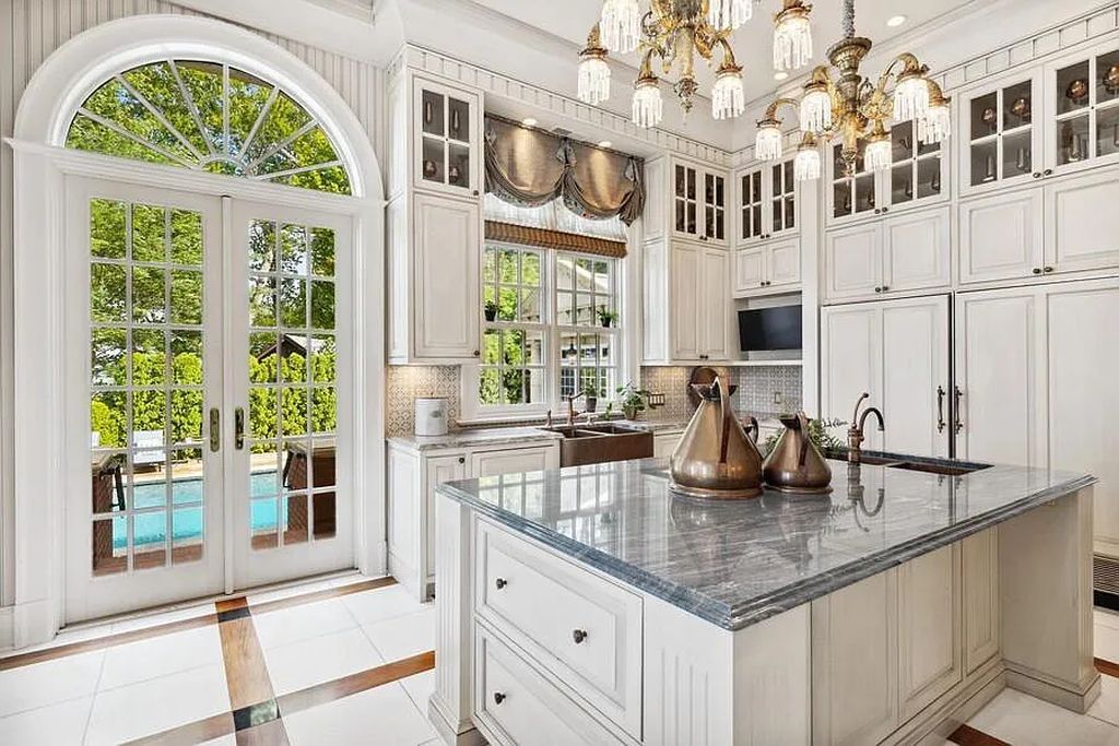 The Estate in Lakeside is a luxurious home of unparalleled quality construction and state-of-the-art amenities now available for sale. This home located at 14612 Meadow Ln, Lakeside, Michigan; offering 09 bedrooms and 13 bathrooms with 10,228 square feet of living spaces.