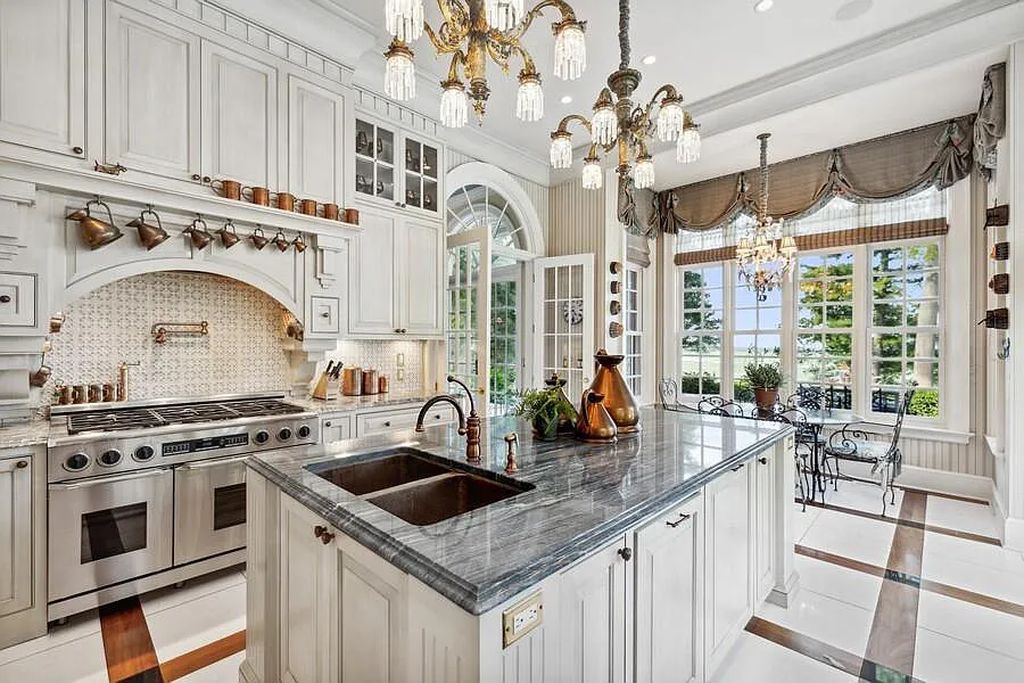 The Estate in Lakeside is a luxurious home of unparalleled quality construction and state-of-the-art amenities now available for sale. This home located at 14612 Meadow Ln, Lakeside, Michigan; offering 09 bedrooms and 13 bathrooms with 10,228 square feet of living spaces.