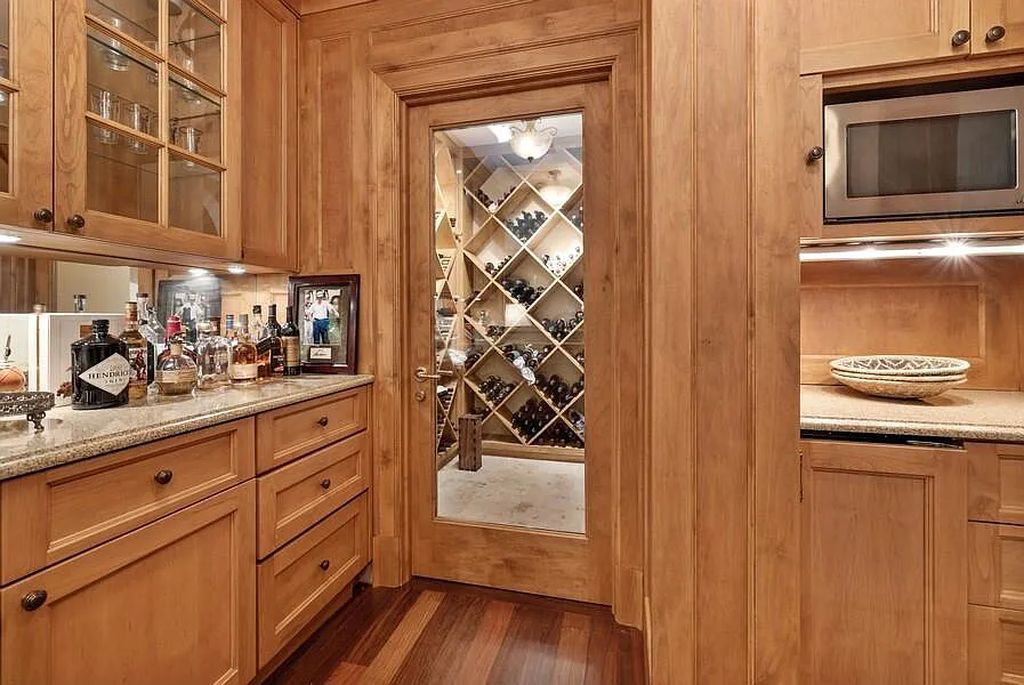 The Estate in Lakeside is a luxurious home of unparalleled quality construction and state-of-the-art amenities now available for sale. This home located at 14612 Meadow Ln, Lakeside, Michigan; offering 09 bedrooms and 13 bathrooms with 10,228 square feet of living spaces.