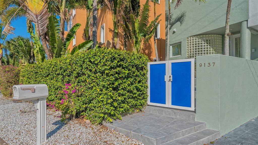 9137 Midnight Pass Road, Sarasota, Florida, is designed by the original owner and architect, Tony Ngai, and features expansive bay views from north to south on a quiet stretch.