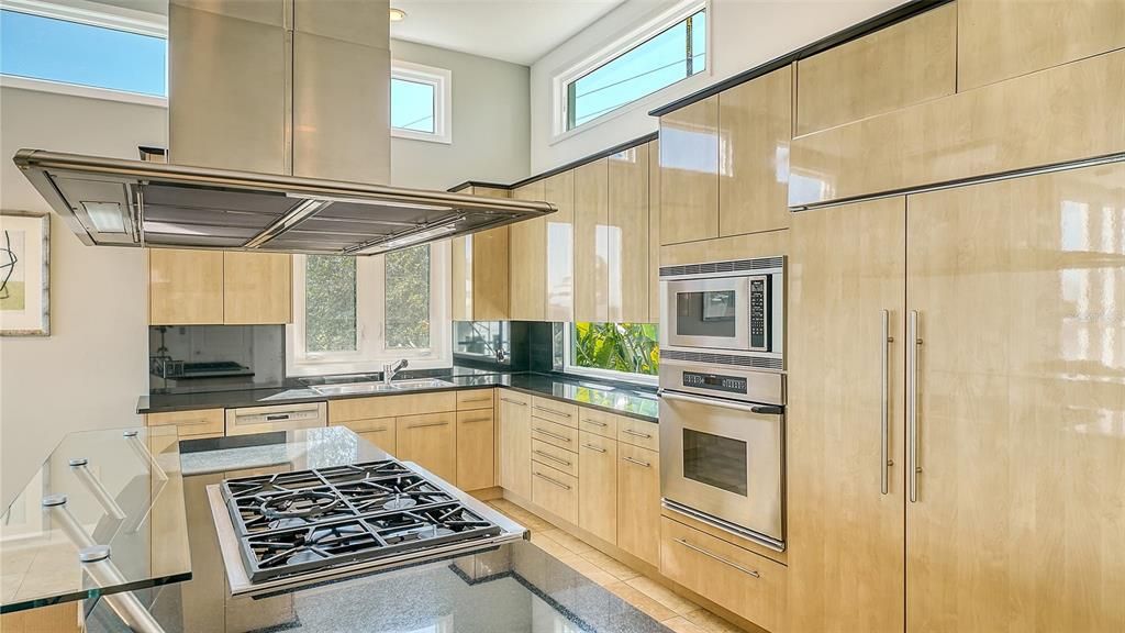 9137 Midnight Pass Road, Sarasota, Florida, is designed by the original owner and architect, Tony Ngai, and features expansive bay views from north to south on a quiet stretch.