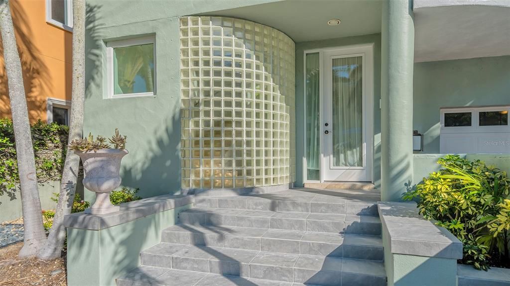 9137 Midnight Pass Road, Sarasota, Florida, is designed by the original owner and architect, Tony Ngai, and features expansive bay views from north to south on a quiet stretch.