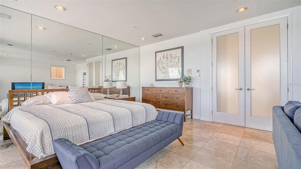 9137 Midnight Pass Road, Sarasota, Florida, is designed by the original owner and architect, Tony Ngai, and features expansive bay views from north to south on a quiet stretch.