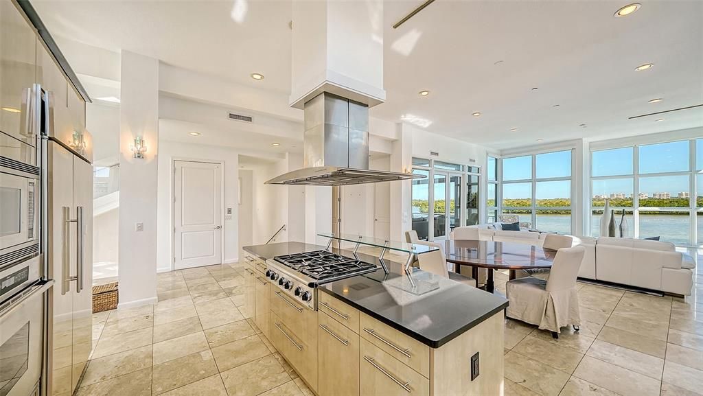 9137 Midnight Pass Road, Sarasota, Florida, is designed by the original owner and architect, Tony Ngai, and features expansive bay views from north to south on a quiet stretch.