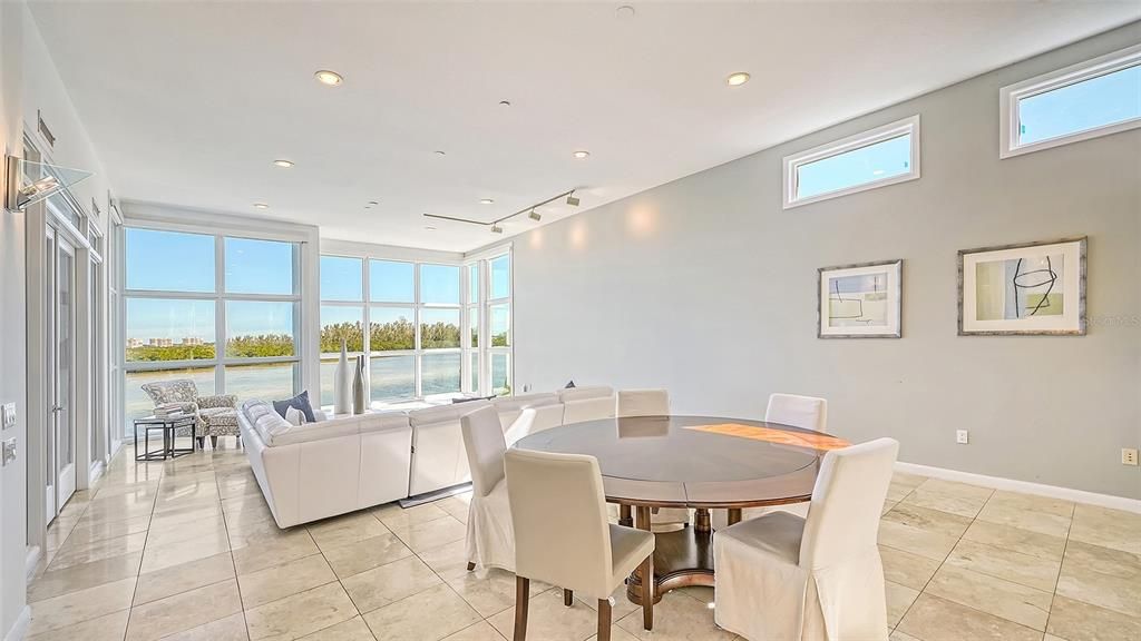 9137 Midnight Pass Road, Sarasota, Florida, is designed by the original owner and architect, Tony Ngai, and features expansive bay views from north to south on a quiet stretch.